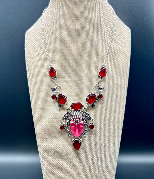 Carved Goddess Face
Simulated Ruby Gemstone
Necklace