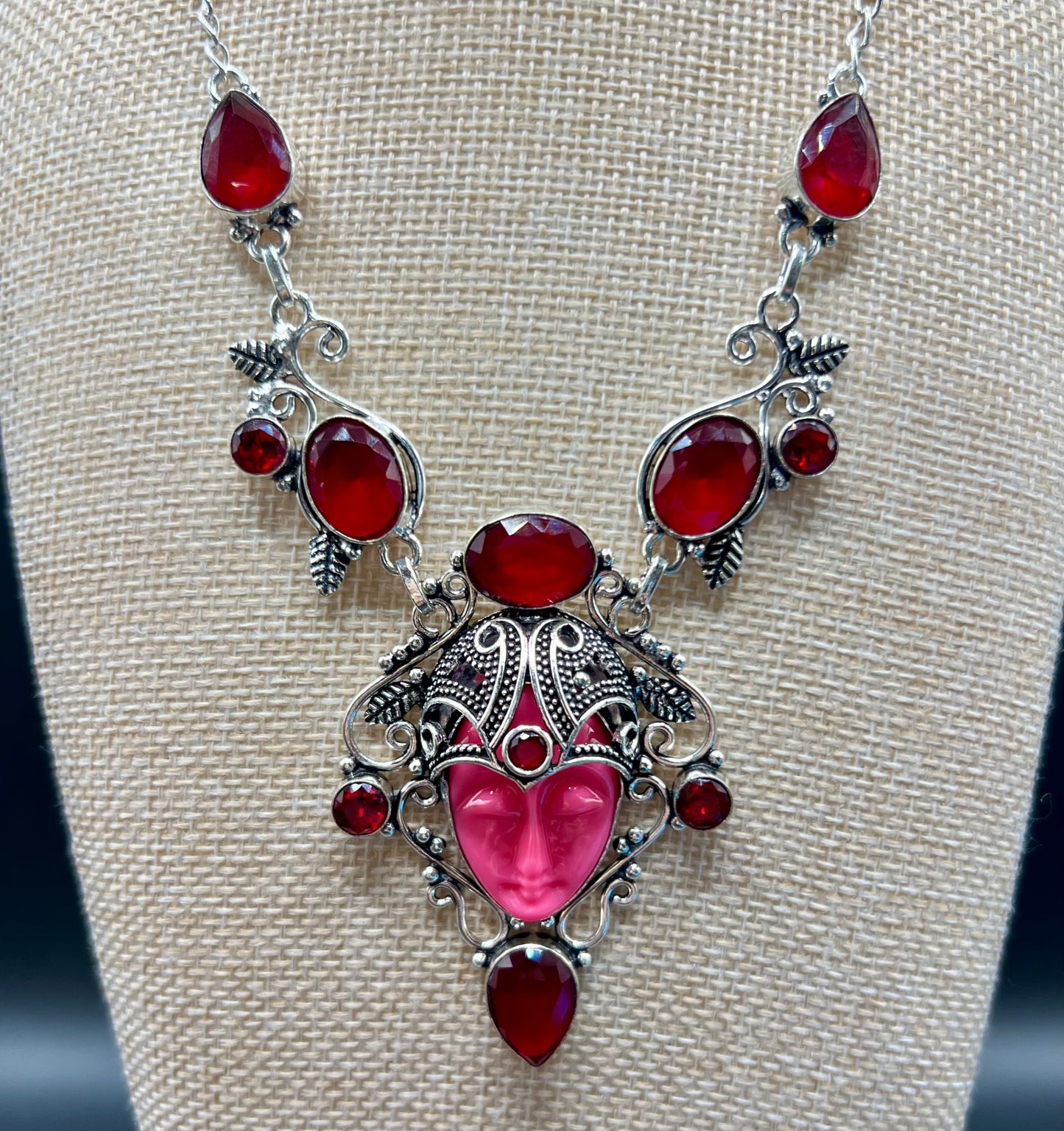 Carved Goddess Face
Simulated Ruby Gemstone
Necklace
